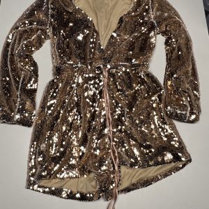 JUMPSUIT GOUD MET GLITTER